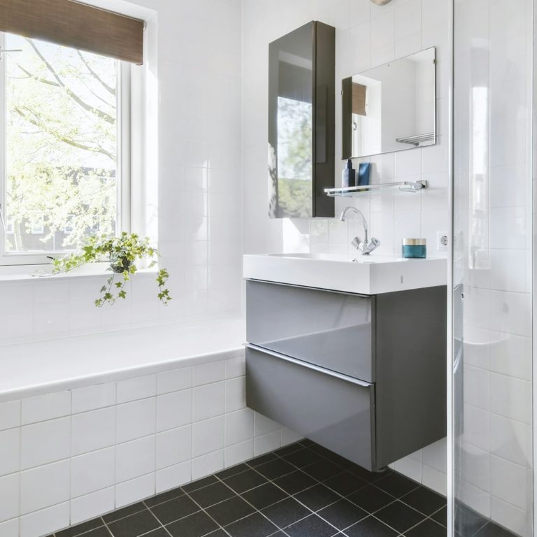 Bathroom with marble walls